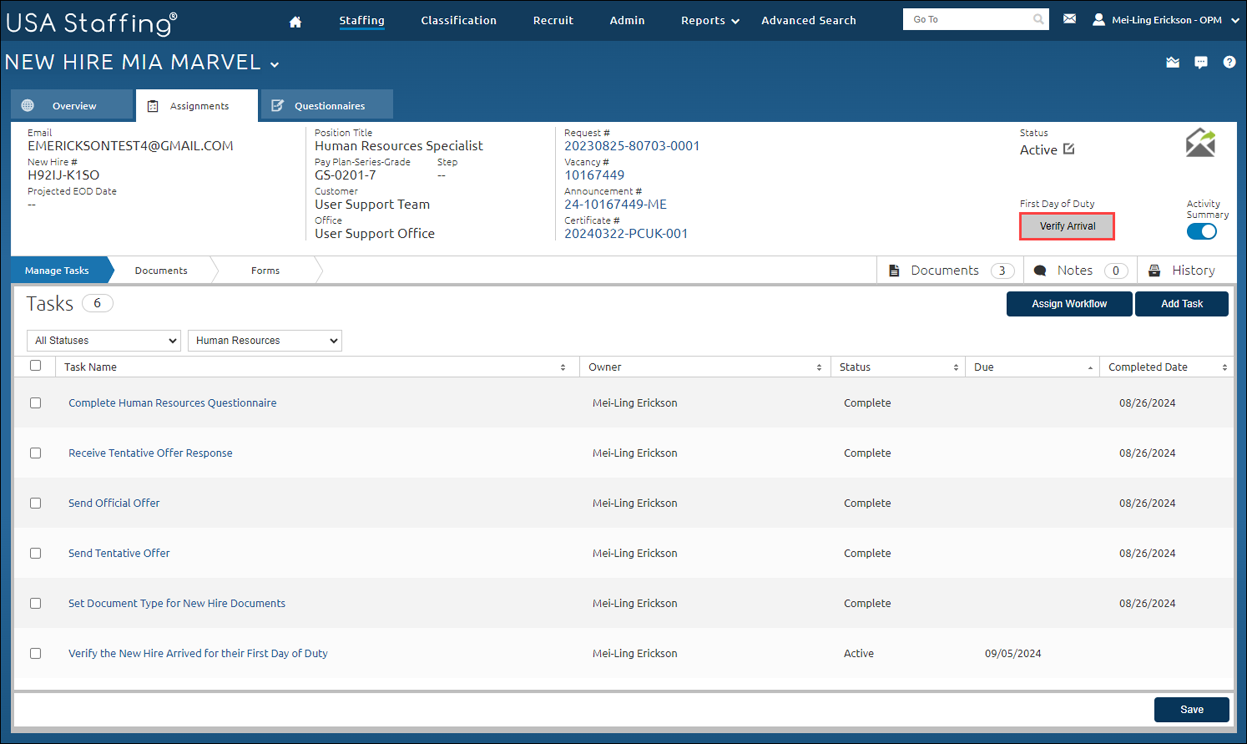 Verify New Hire Arrived for First Day of Duty button highlighted from the Assignments tab.