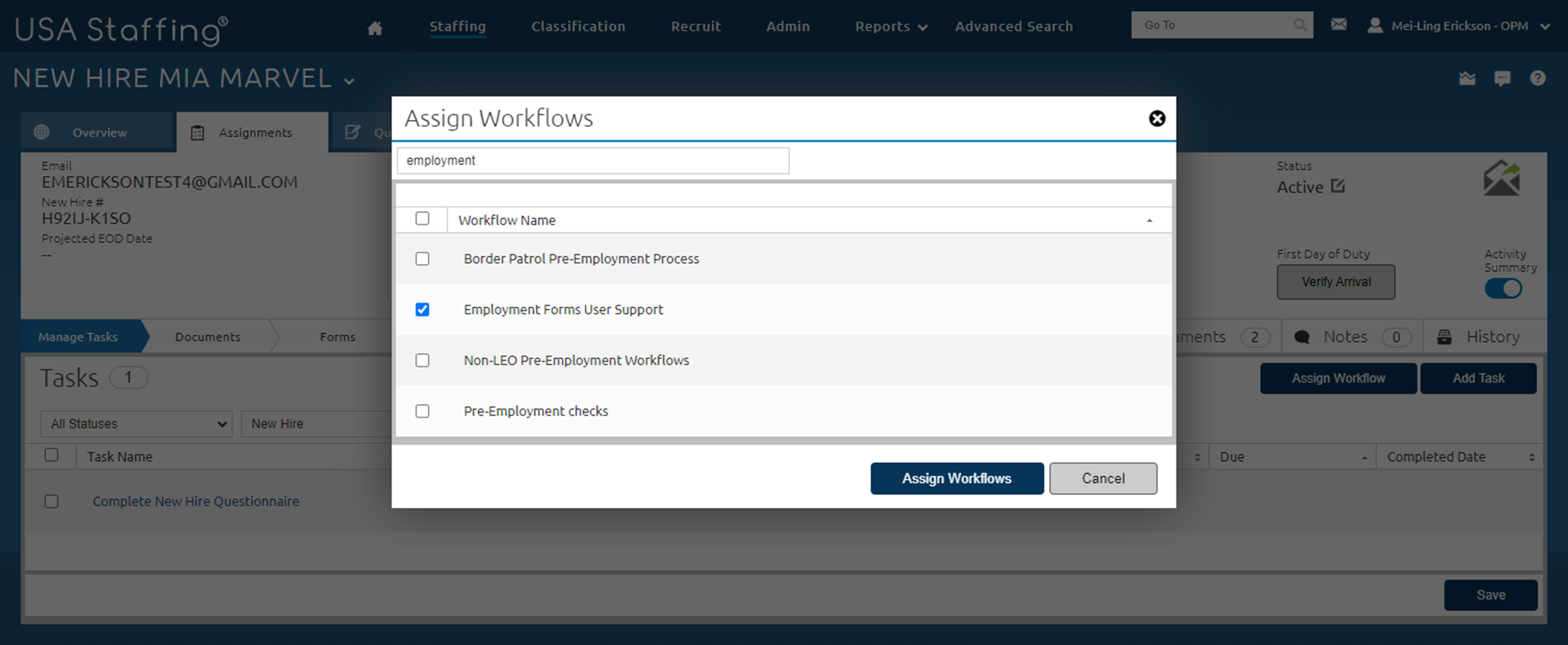A new hire’s record is on the Manage Tasks page displaying the Assign Workflows pop-up.