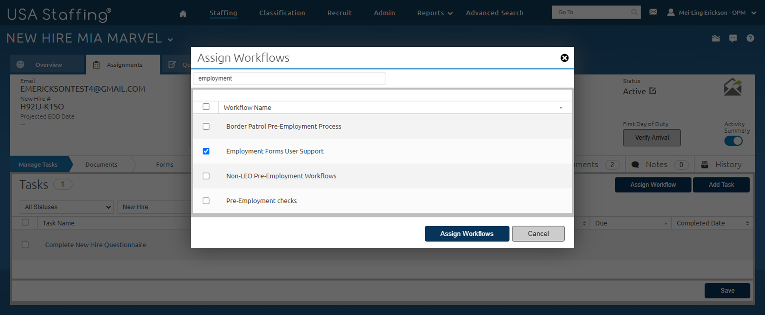 A new hire’s record is on the Manage Tasks page displaying the Assign Workflows pop-up.